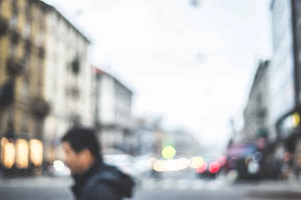 Blurred city and people — Stock Photo, Image