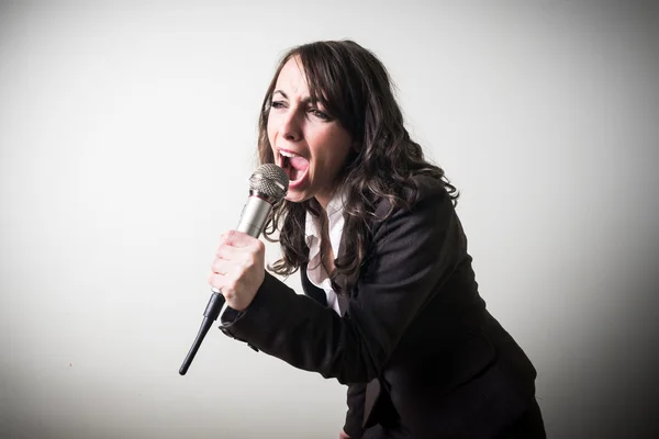 Singing beautiful young businesswoman — Stock Photo, Image