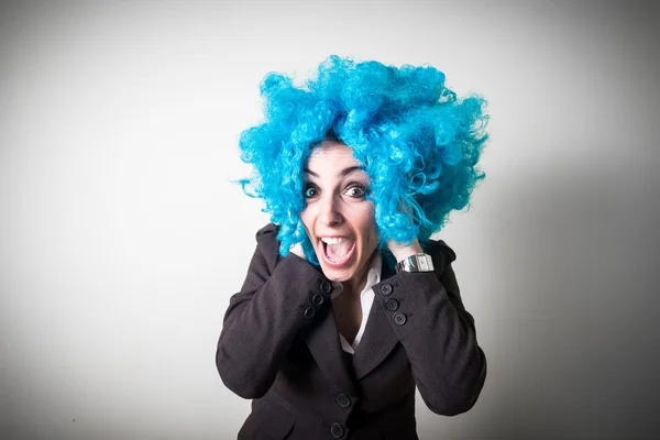 Funny blu wig beautiful young businesswoman — Stock Photo, Image