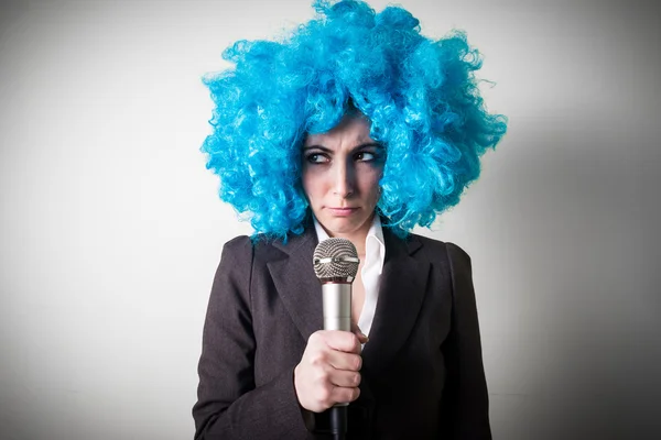 Funny blu wig beautiful young businesswoman — Stock Photo, Image