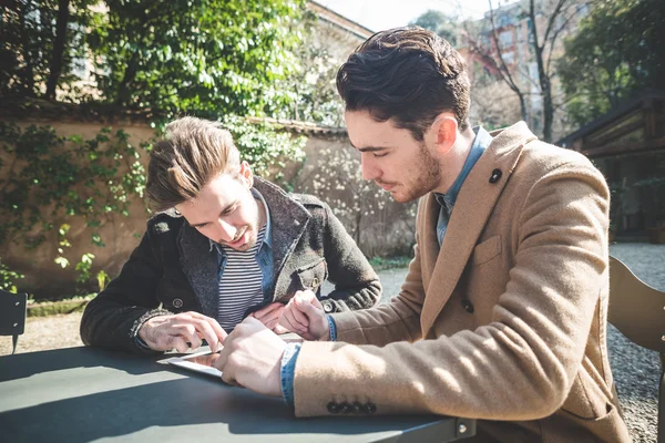 Two businessmen using tablet — Stock Photo, Image