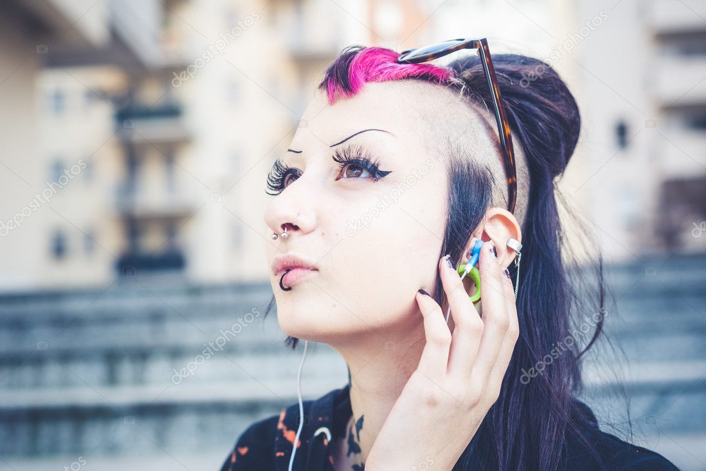Punk girl listening music
