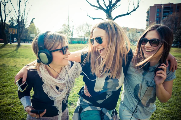 Three beautiful friends authentic Stock Photo