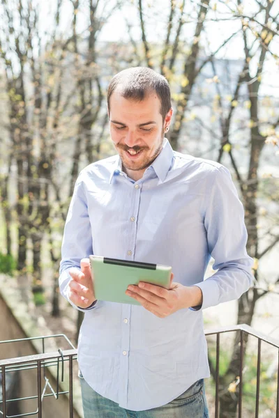 Multitasking multimedia man — Stock Photo, Image