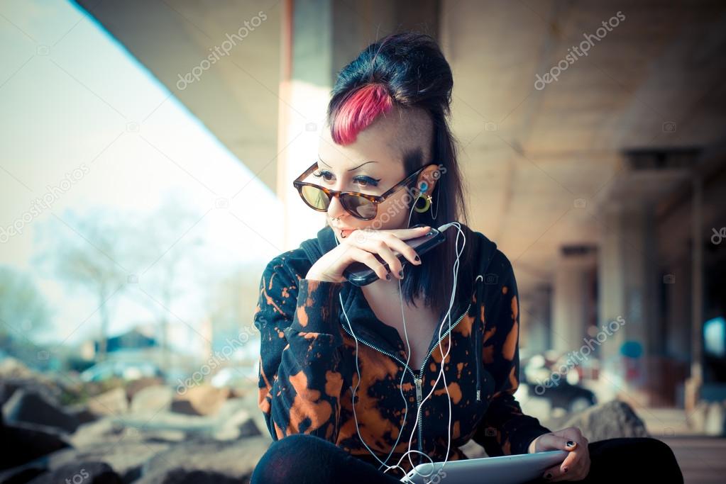 Punk girl using tablet