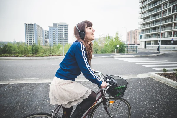 Beautiful woman biker cycling — Stock Photo, Image