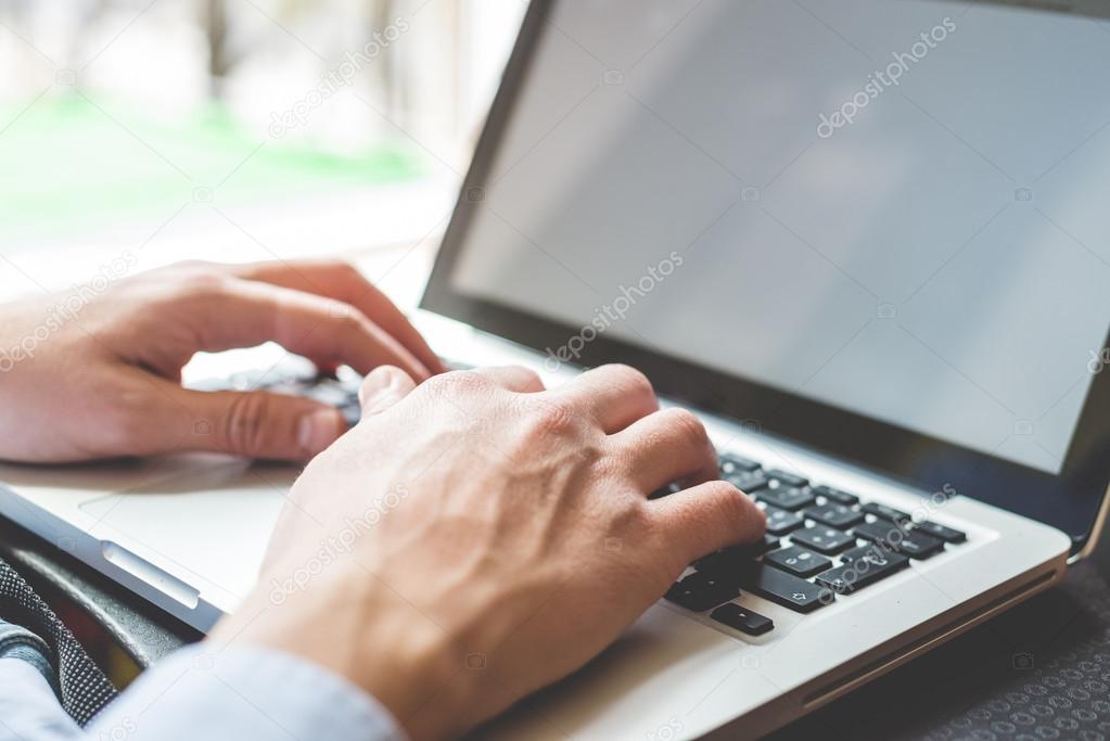 Hands  using  laptop