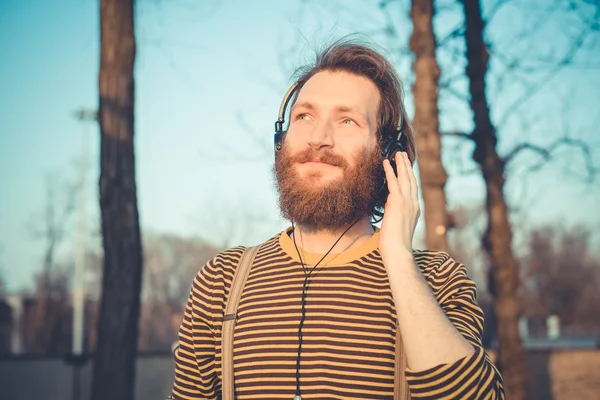 Hipster man listening music — Stock Photo, Image