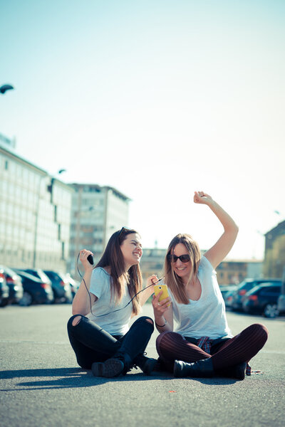 Two  young women dancing