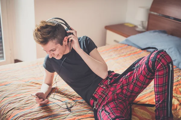 Lesbian  woman listening to music — Stock Photo, Image