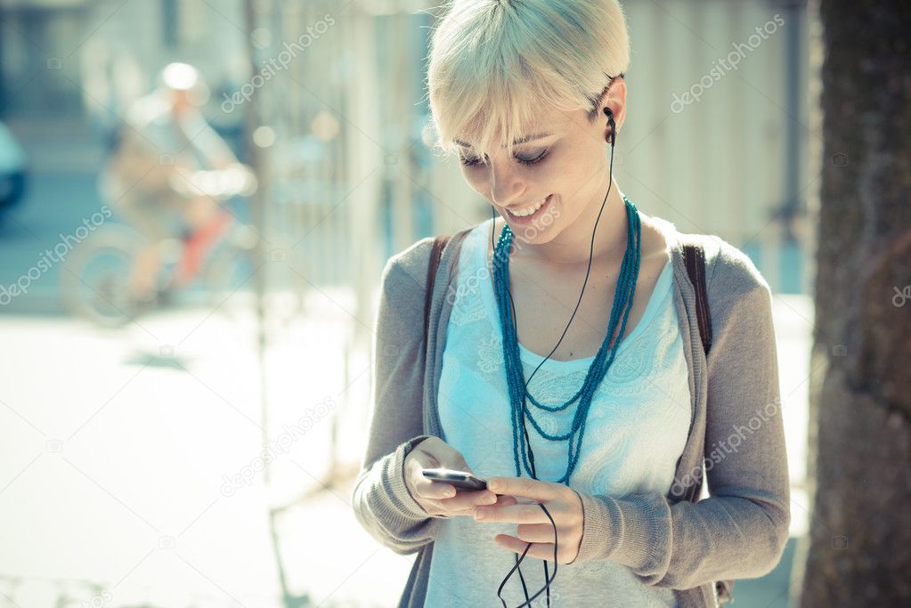 Hipster woman listening music