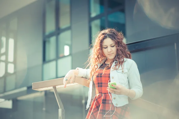 Curly  hipster woman  listening music — Stock Photo, Image