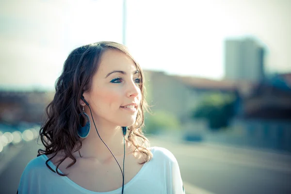 Young beautiful brunette woman with smart phone — Stock Photo, Image