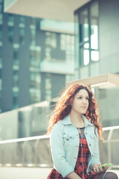 Young beautiful hipster woman with red curly hair — Stock Photo, Image