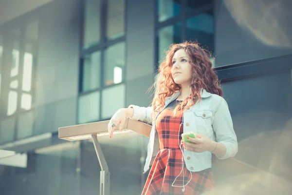 Young beautiful hipster woman with red curly hair — Stock Photo, Image