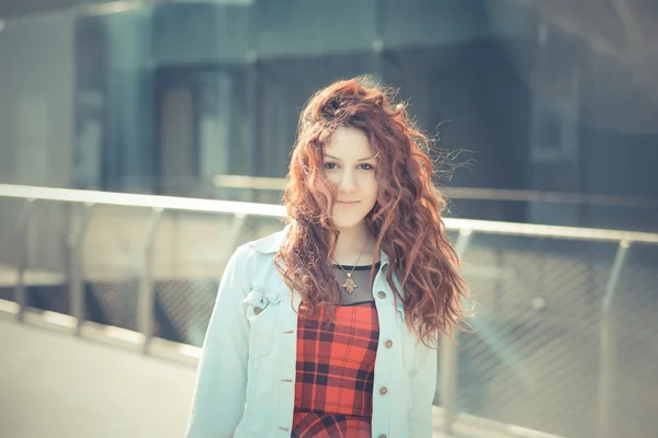 Woman with red curly hair — Stock Photo, Image