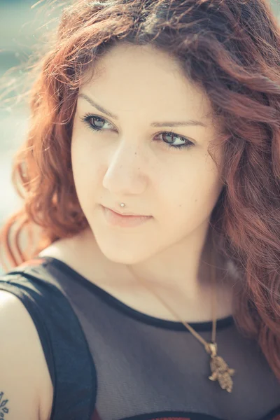 Young beautiful hipster woman with red curly hair — Stock Photo, Image