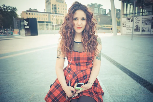 Young beautiful hipster woman with red curly hair — Stock Photo, Image