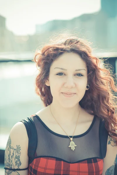 Young beautiful hipster woman with red curly hair — Stock Photo, Image