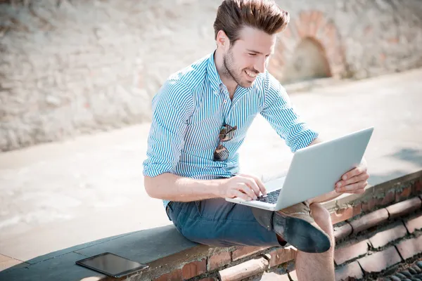 Hipster man  using notebook — Stock Photo, Image