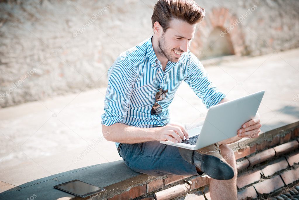 Hipster man  using notebook