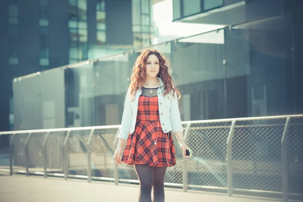 Woman with red curly hair — Stock Photo, Image