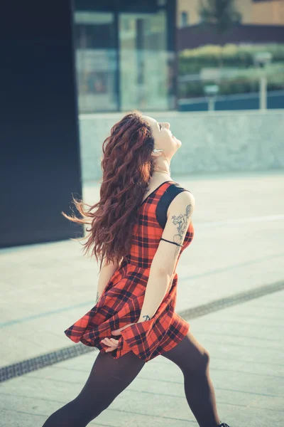 Woman with red curly hair — Stock Photo, Image