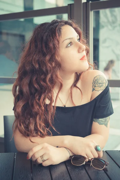 Woman with red curly hair — Stock Photo, Image