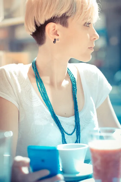 Hipster woman using smart phone — Stock Photo, Image
