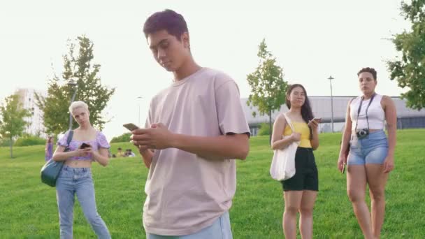 Young Happy Asiatic Man Outdoor Using Smartphone Hand Hold Looking — Stock Video