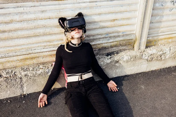 Young Diverse Non Binary Woman Outdoor Lying Floor Using Augmented — Stock Photo, Image