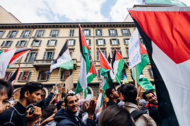 MILAN, ITALY - APRIL 25 2022: People took the streets in Milan to celebrate the anniversary of the liberation of Italy from Nazism and Fascism and claiming justice for Palestine