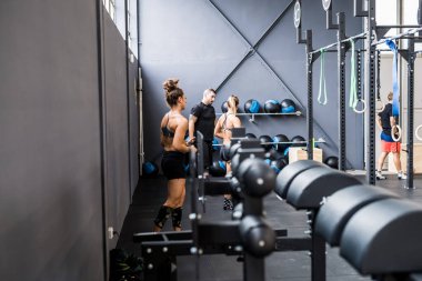 Sportive people indoors gym training body building healthy lifestyle