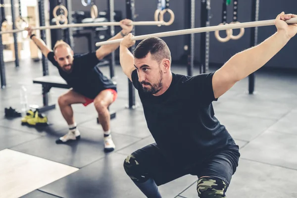 Two Sportive Athlete Body Builders Men Indoors Gym Training Weightlifting — Stock Fotó