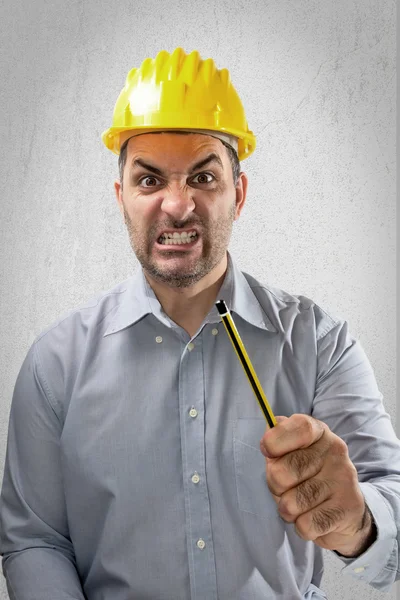 Thoughtful engineer with helmet on head — Stock Photo, Image