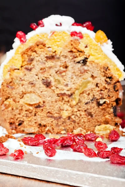 Red candieds and christmas cake — Stock Photo, Image