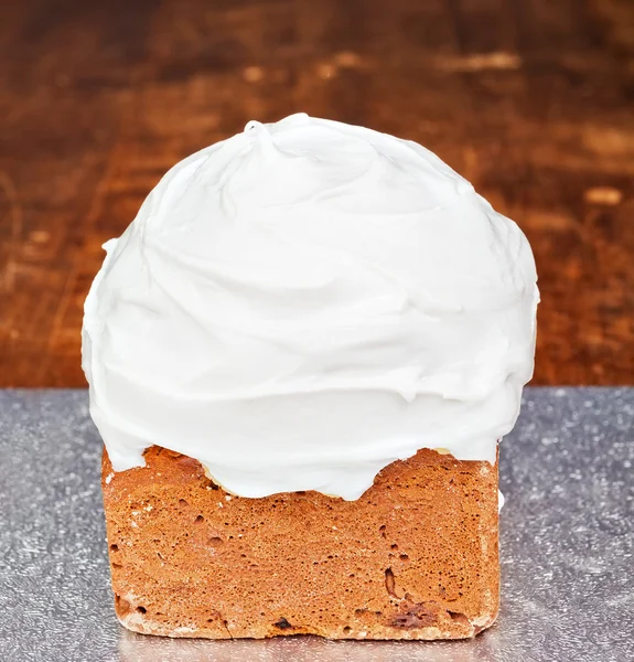 Christmas cake covered with cream — Stock Photo, Image