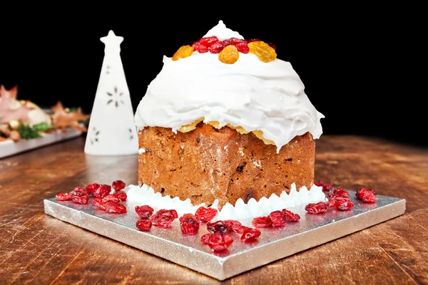 Christmas cake and white candle — Stock Photo, Image