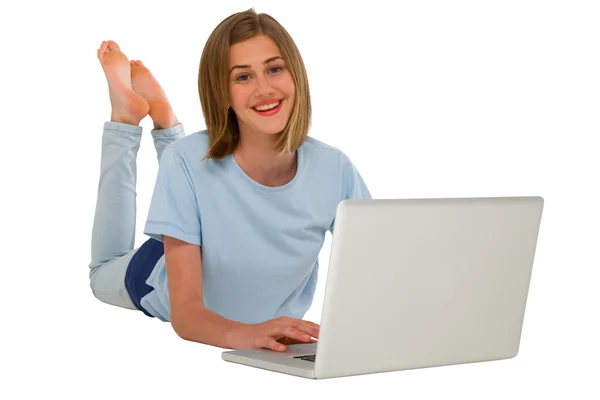 Teenage girl using laptop — Stock Photo, Image