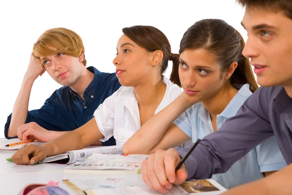 Teenagers in classroom — Stock Photo, Image