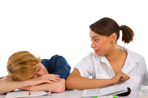 Teenage boy sleeping in classroom — Stock Photo, Image