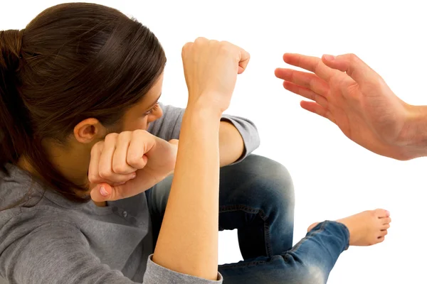 Teenage girl protect herself with arms crossed in front of face — Stock Photo, Image