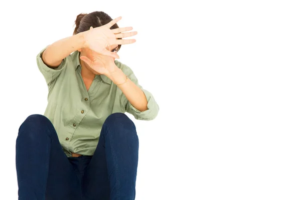 Teenage girl protect herself with arms in front of face — Stock Photo, Image