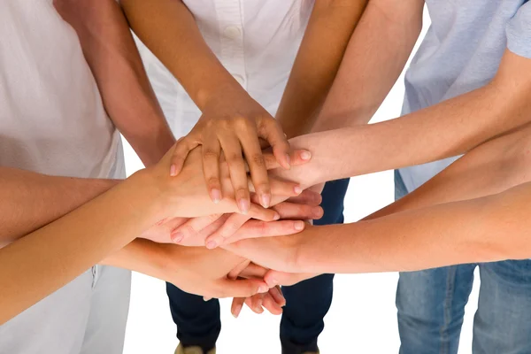Teenagers with hands together Stock Picture