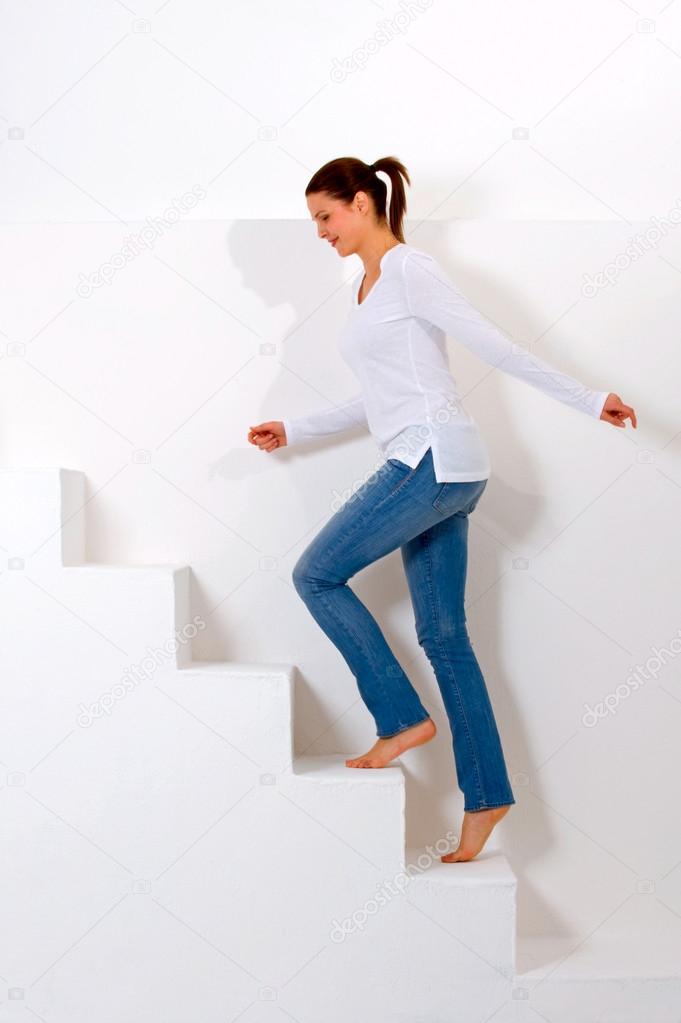 Woman climbing the stairs