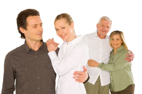 Husband wife father in law mother in law standing on white backg — Stock Photo, Image