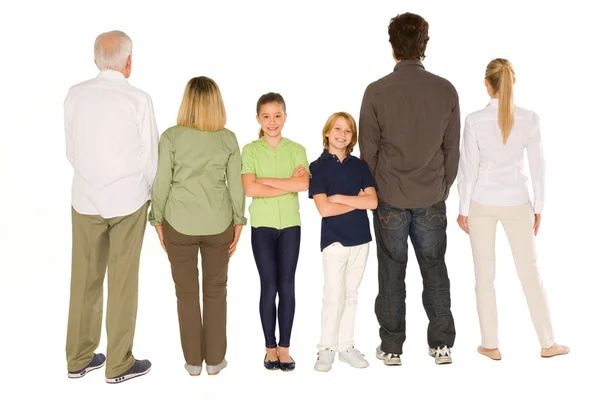 Três gerações família de pé isolado sobre fundo branco — Fotografia de Stock
