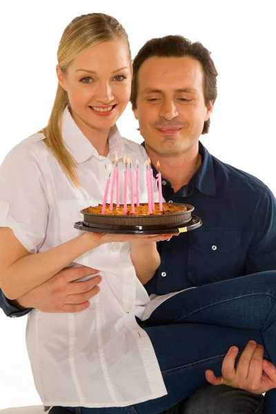 Casal celebrando aniversário com bolo — Fotografia de Stock