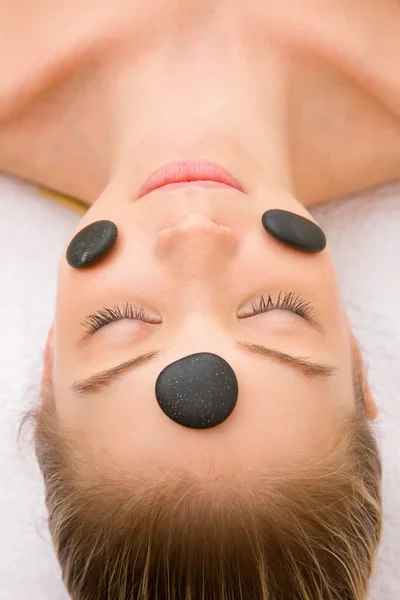 Stones face of a woman in spa — Stock Photo, Image