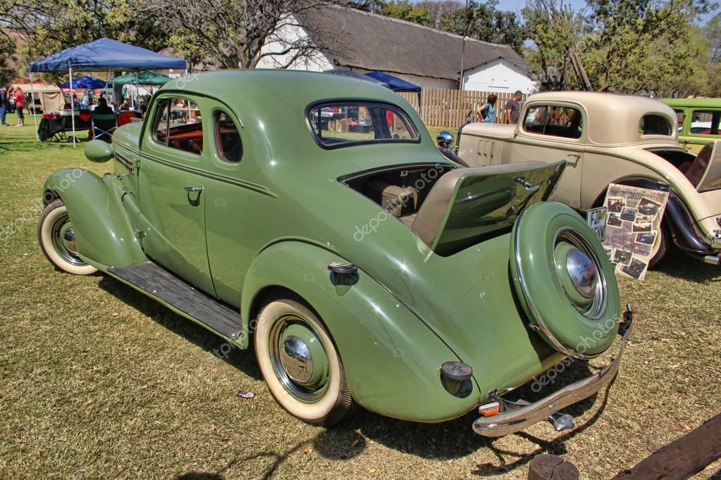 1936 Ford Two Door Coupe With Rumble Seat Rear Side View Stock